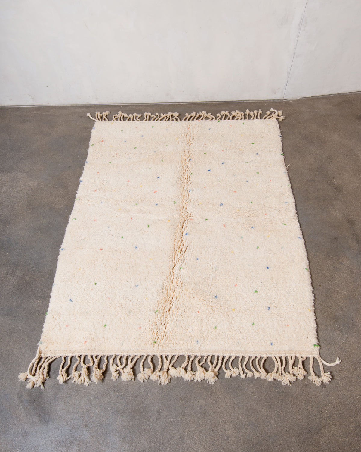 Modern, designer, handcrafted Berber rug from Morocco. Beniourain carpet with beautiful colours and patterns and fluffy wool texture.